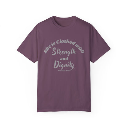 A purple women's t-shirt with the text 'She is Clothed with Strength and Dignity' from Proverbs 31:25.